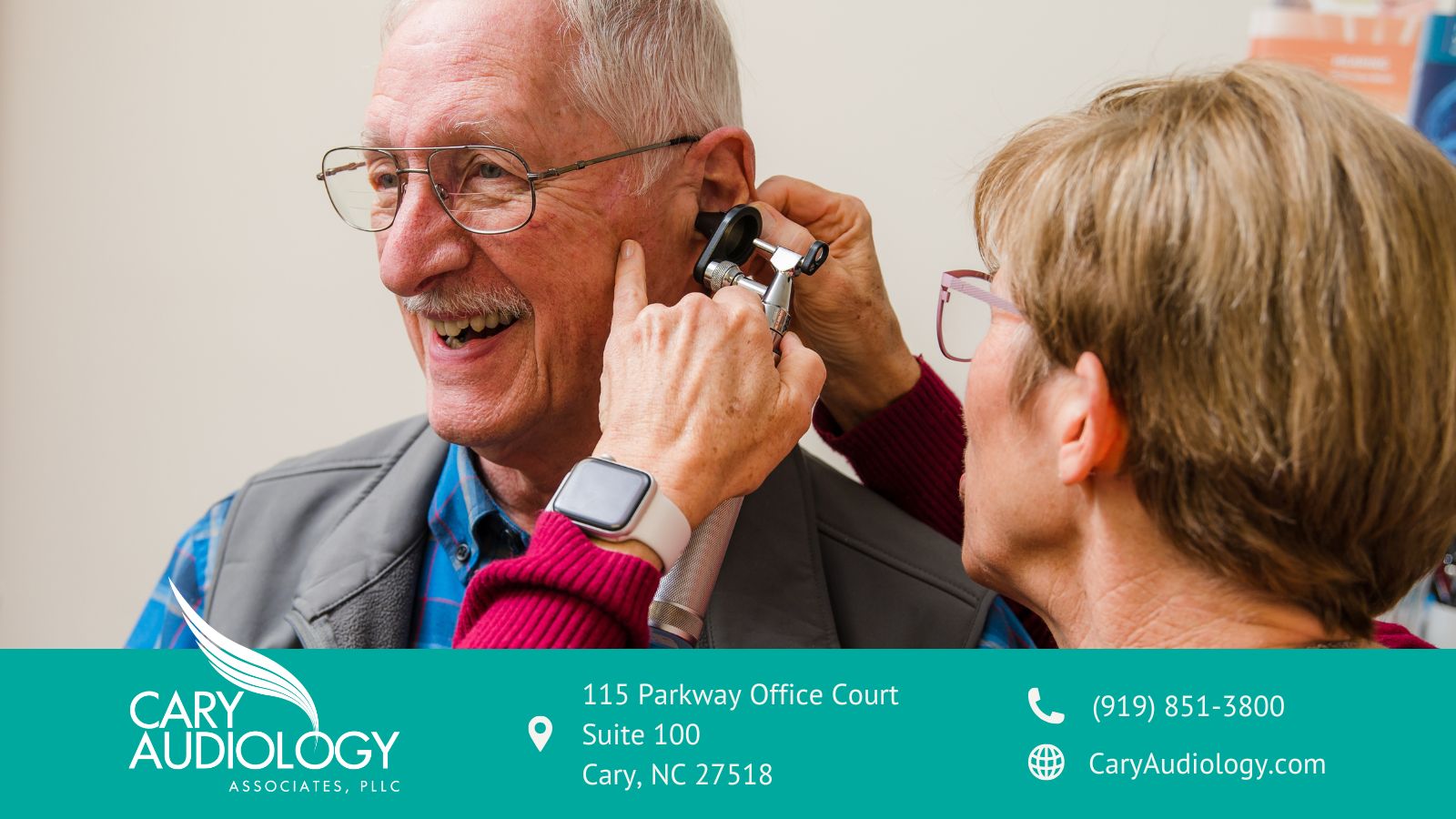 An elderly man is being examined in the ear.